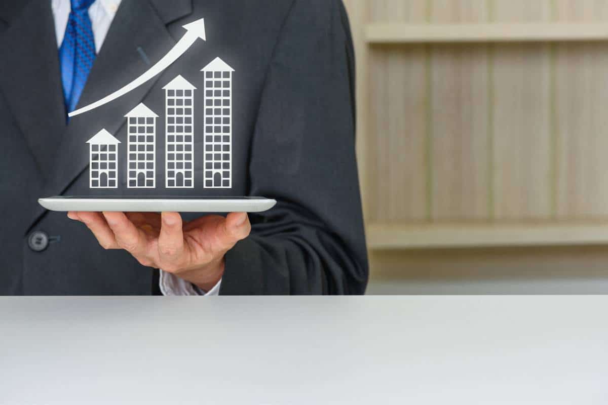 patrimoine immobilier : clé et maison symbolisant l'investissement immobilier